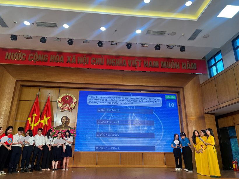 A picture containing text, ceiling, store, hall

Description automatically generated