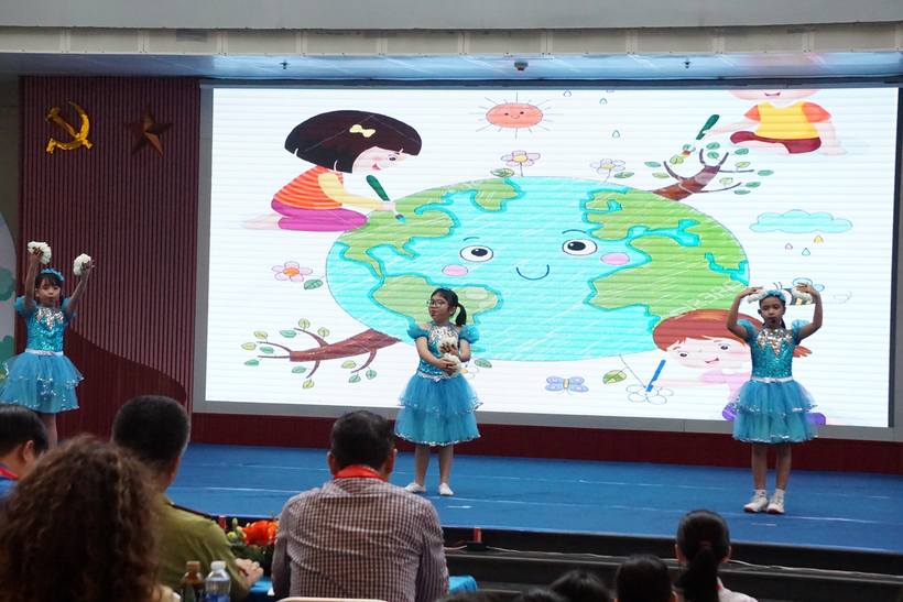 A group of girls performing on a stage

Description automatically generated with medium confidence