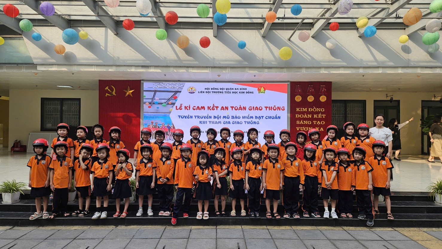 A group of children in uniform

Description automatically generated