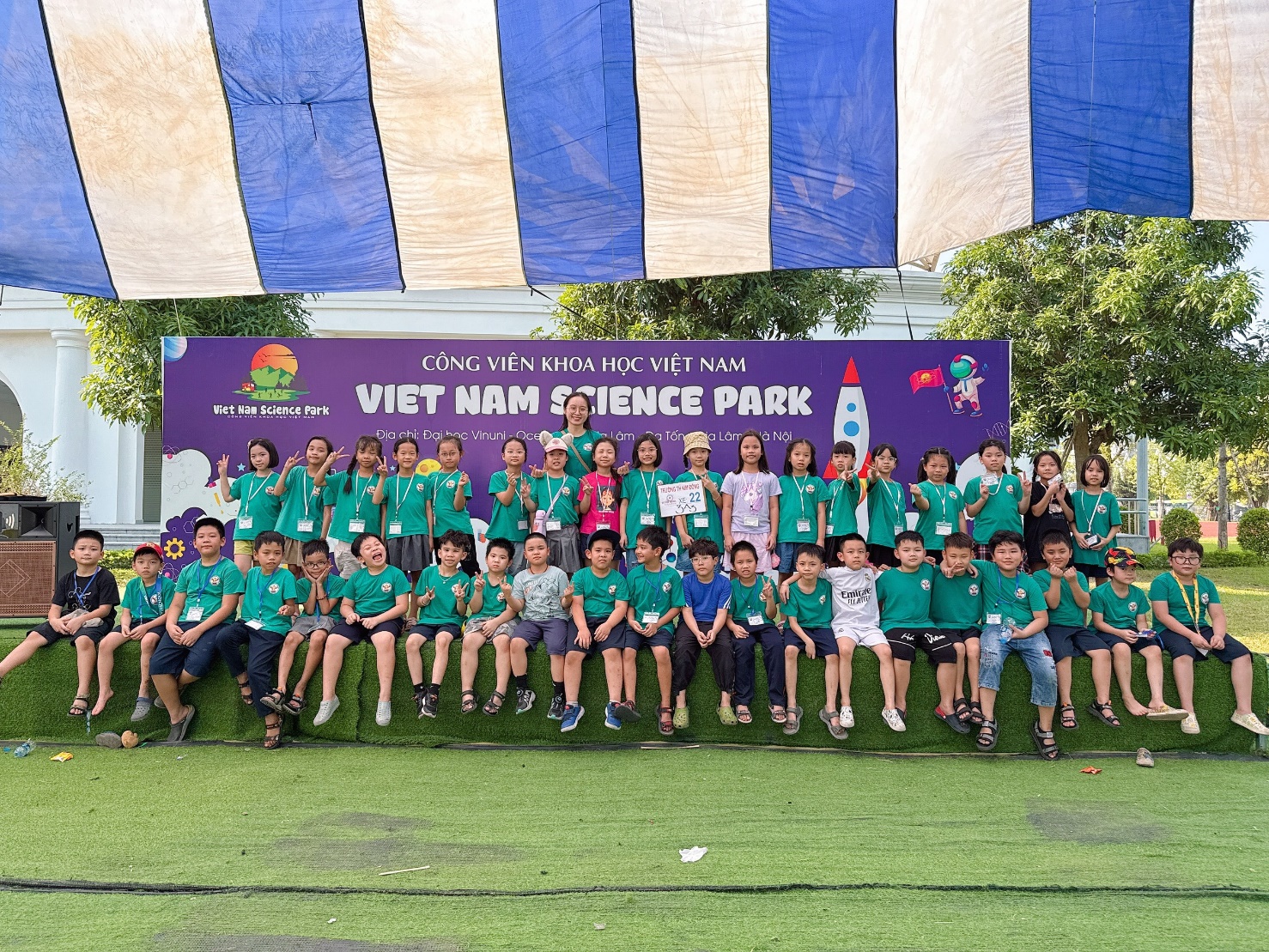 A group of children posing for a photo
Description automatically generated