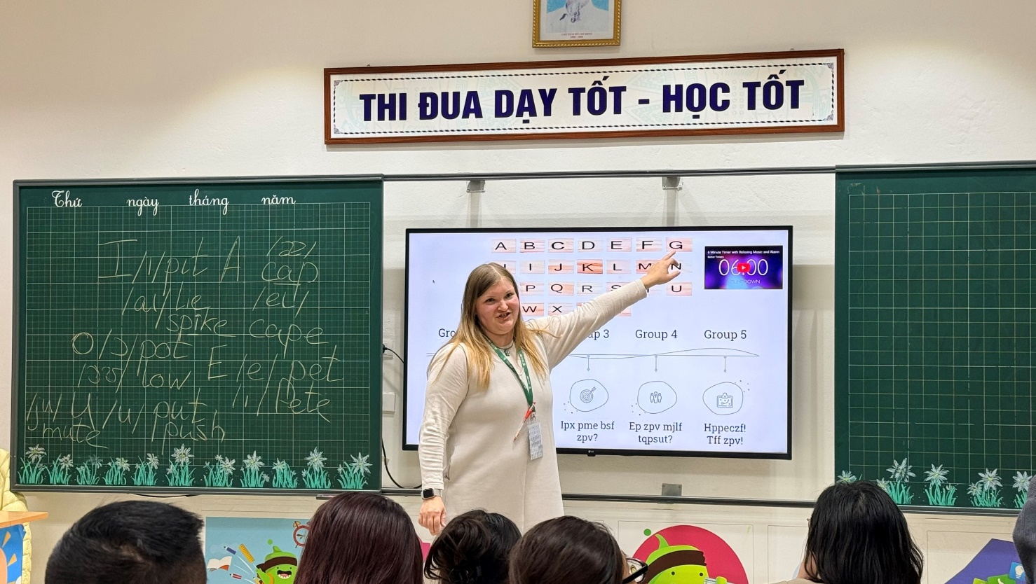 A person pointing at a whiteboard
AI-generated content may be incorrect.