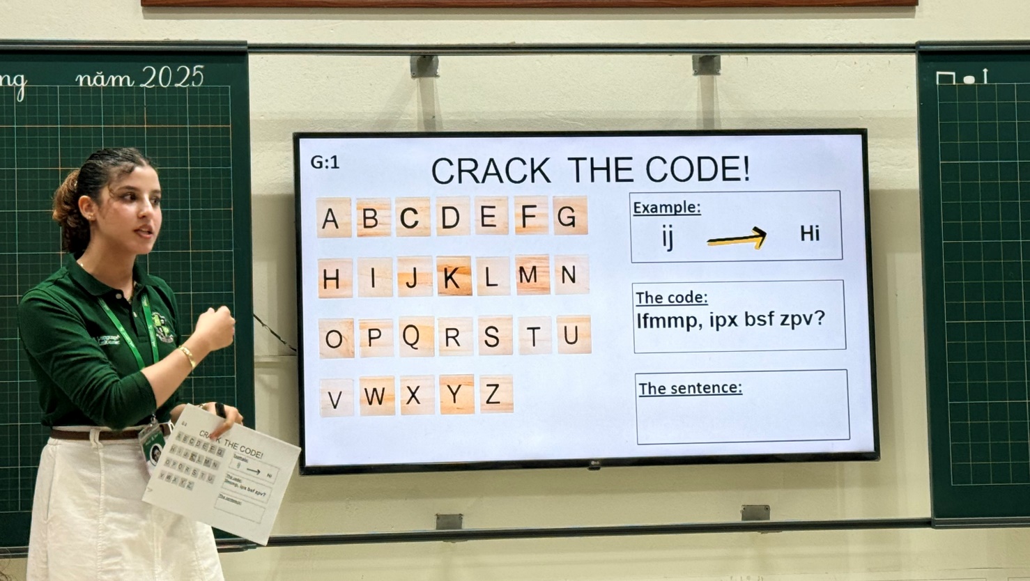 A person standing next to a white board
AI-generated content may be incorrect.