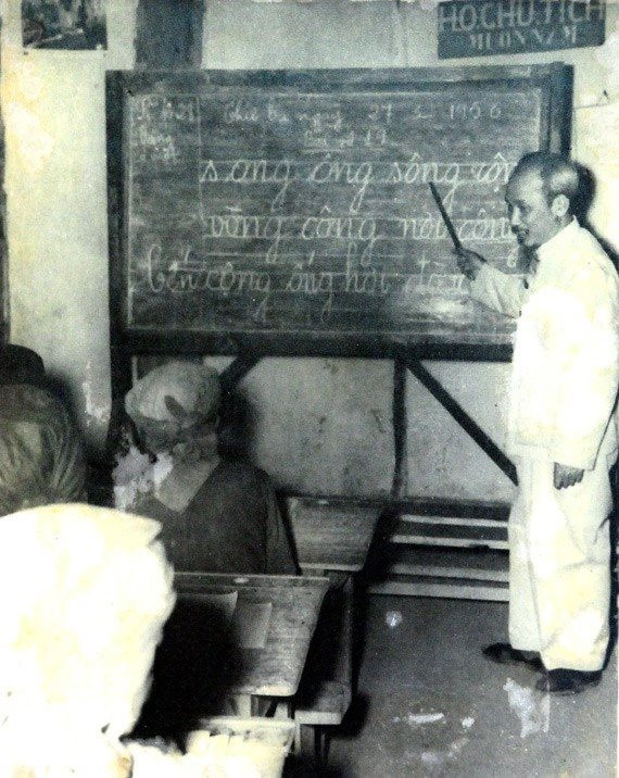 A person writing on a chalkboard
AI-generated content may be incorrect.