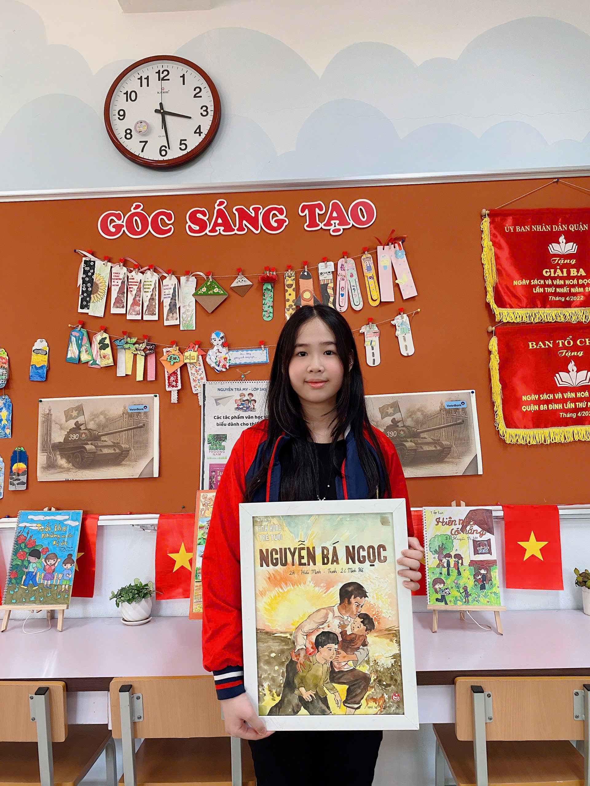 A person holding a poster
AI-generated content may be incorrect.