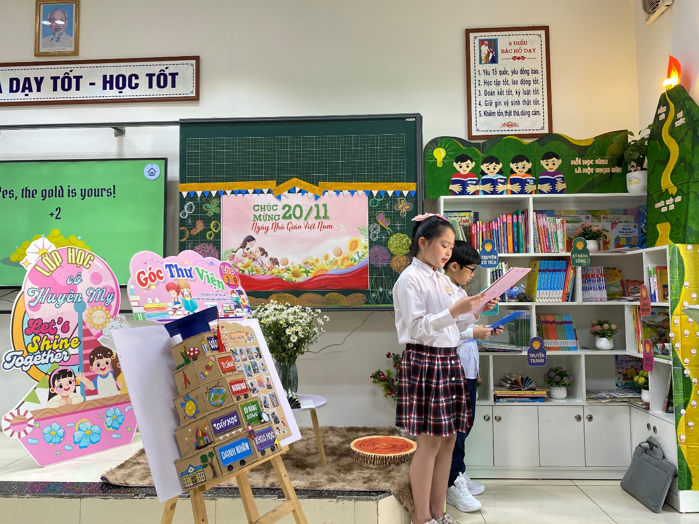 A group of kids in a classroom
Description automatically generated