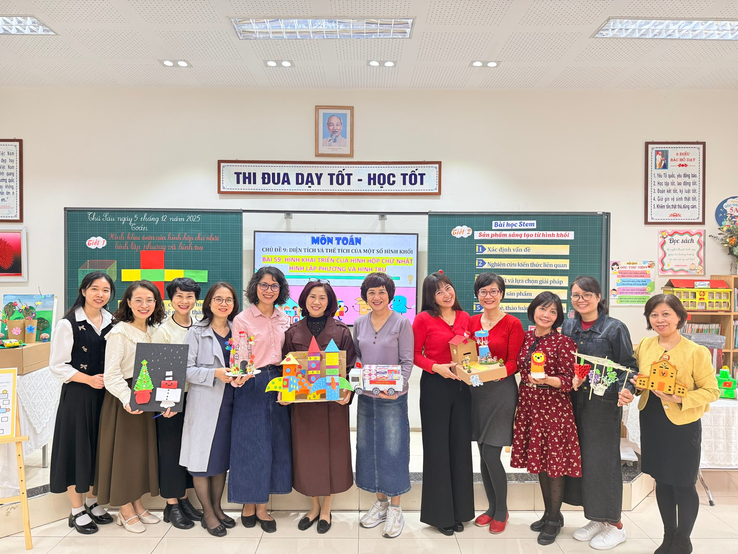 A group of people posing for a photo
Description automatically generated