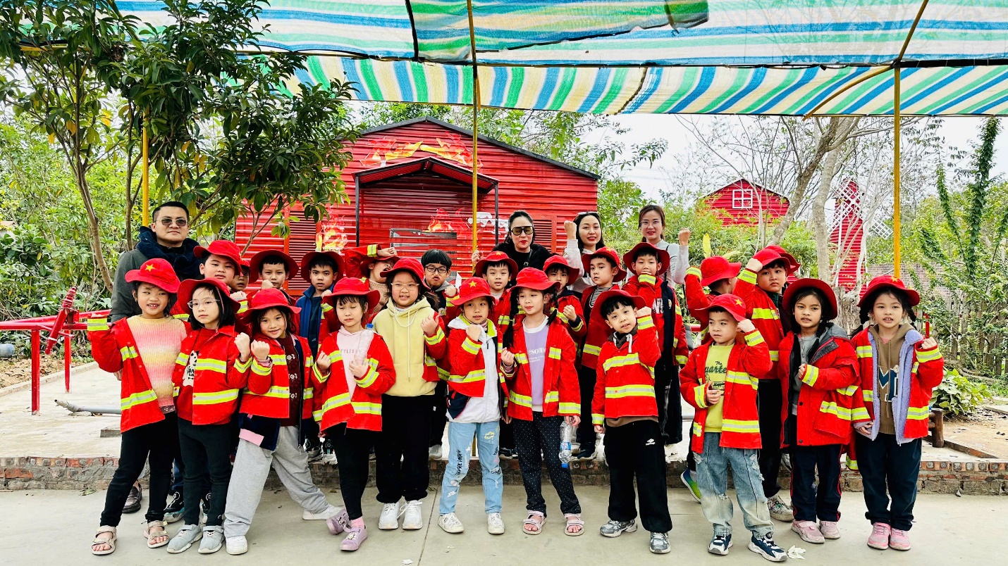 A group of children wearing matching red and yellow jackets
AI-generated content may be incorrect.