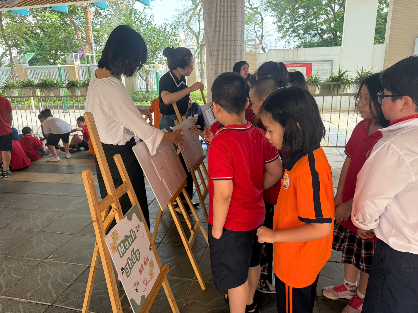 A group of children standing around easels
AI-generated content may be incorrect.