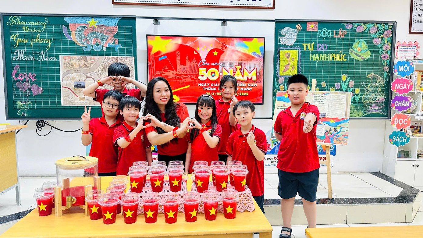 A group of children in red shirts
Description automatically generated