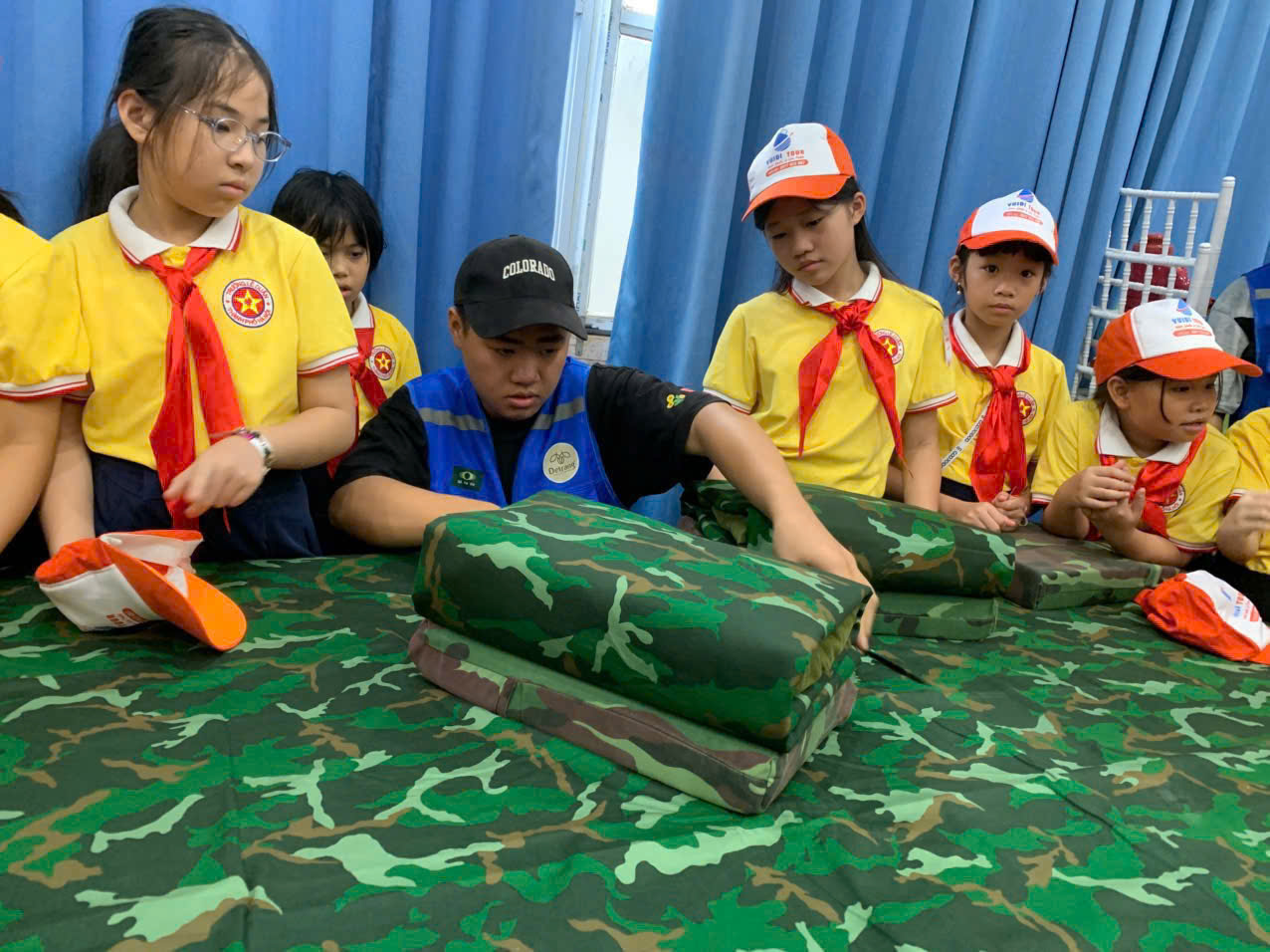 A group of kids wearing matching outfits
AI-generated content may be incorrect.