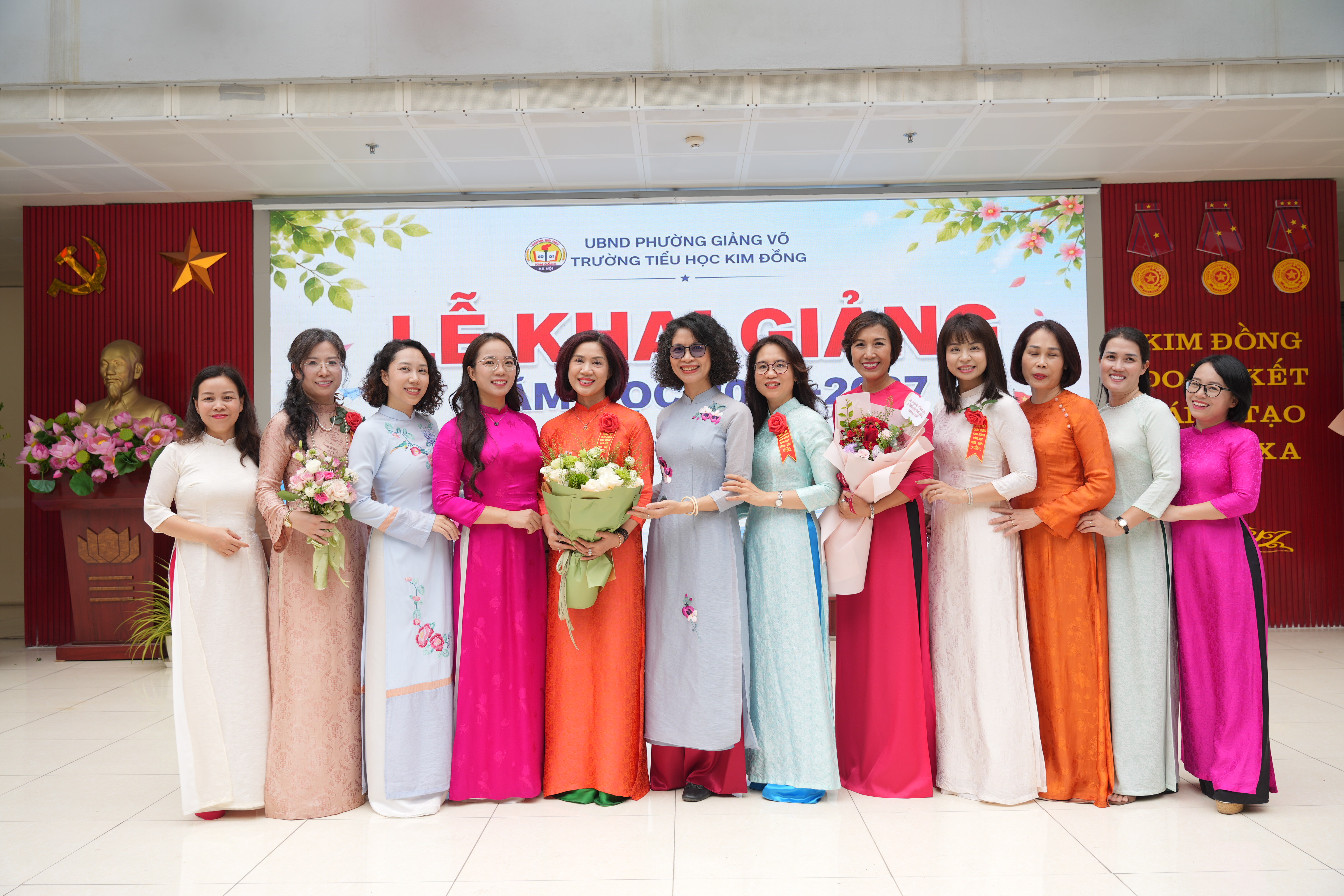 A group of women in long dresses

Description automatically generated
