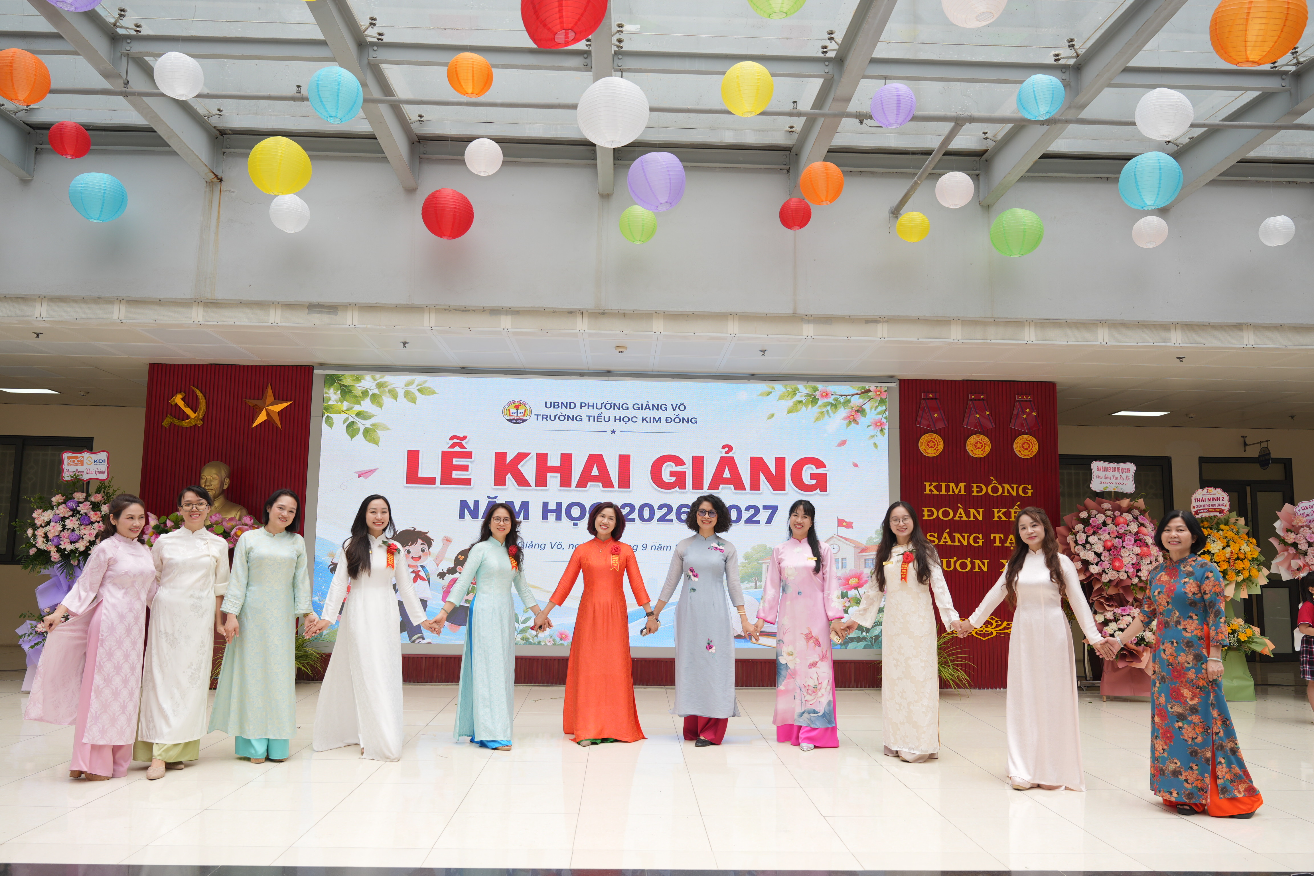 A group of women in long dresses

Description automatically generated