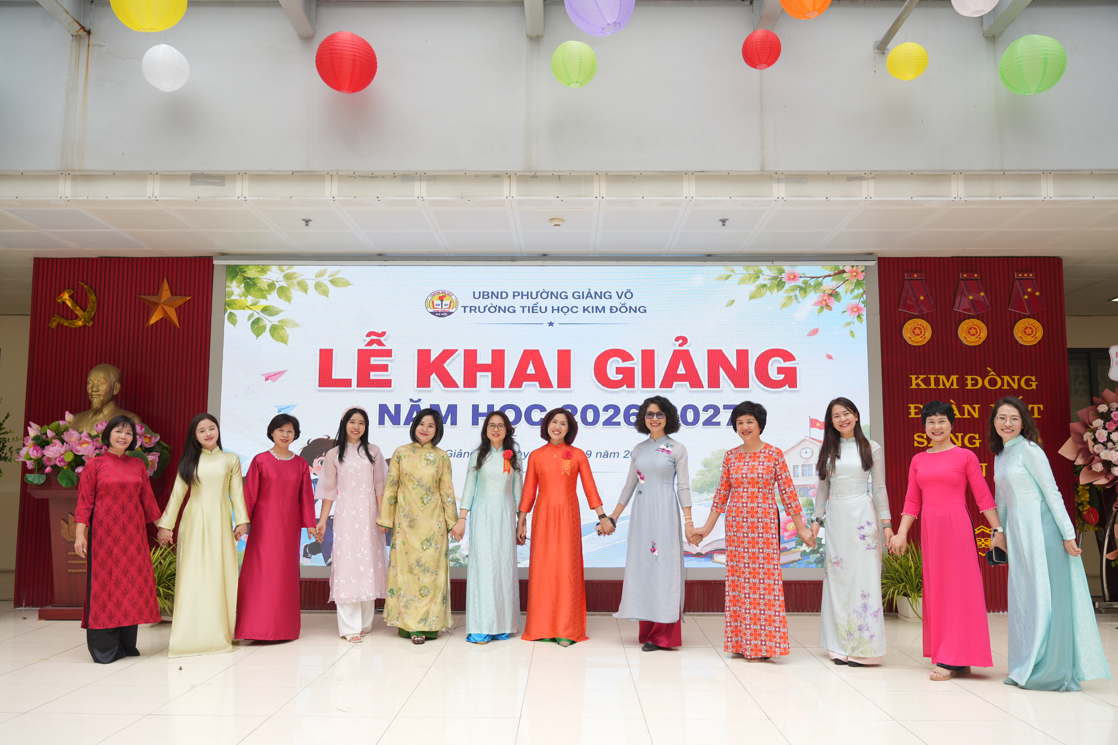 A group of women in long dresses

Description automatically generated